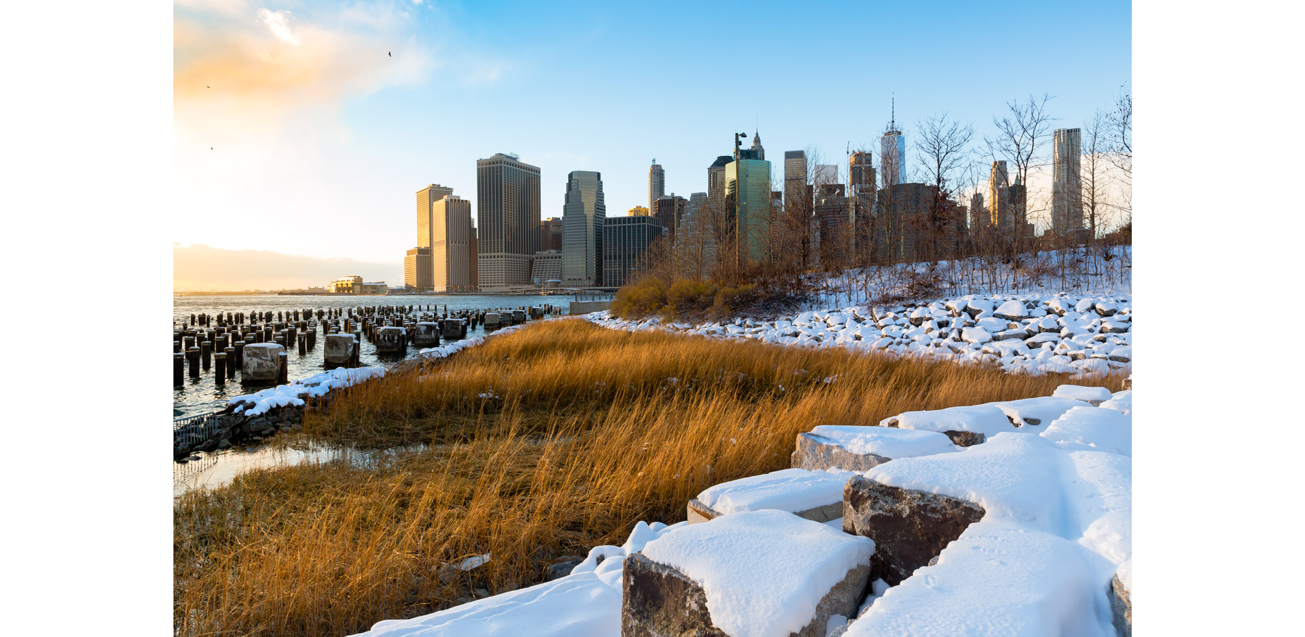 riprap and salt marsh grass provide a naturalized transition from land to water, and frames river views for seated onlookers and passers-by. To the le…