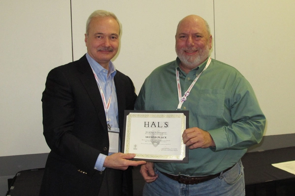Second place winner Douglas Nelson accepting the award from Paul Dolinsky, Chief of HALS. image: Chris Stevens